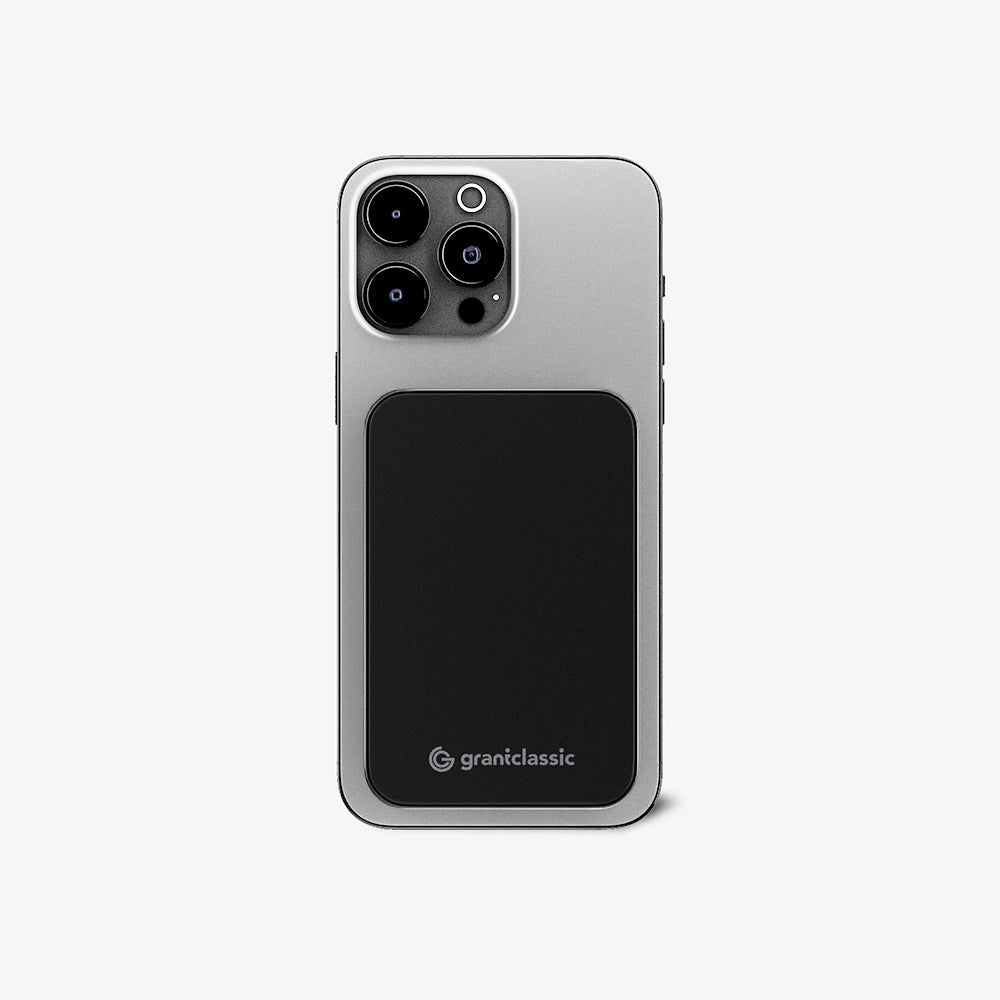TITANSHIELD Solid-State Power Bank attached to the back of a phone, rear view | grantclassic