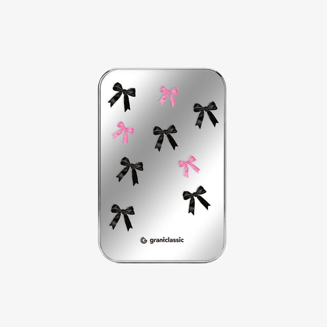 TITANSHIELD Solid-State Power Bank Mirror Edition on the back of an iPhone | grantclassic