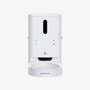 LuxNourish automatic cat and dog feeder, white body seen from the front with the food outlet | grantclassic