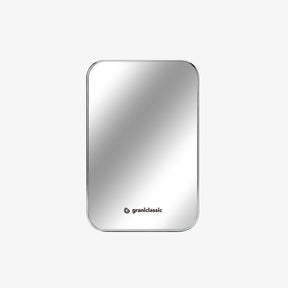 TITANSHIELD Mirror Edition, woman using it attached to the back of her phone | grantclassic
