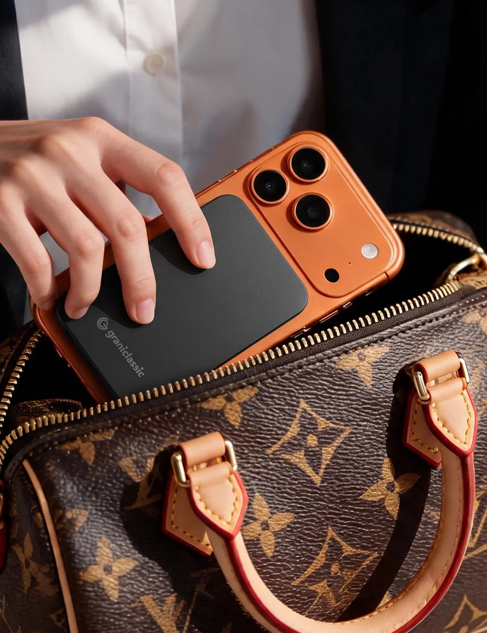 TITANSHIELD Air on an iPhone inside a handbag