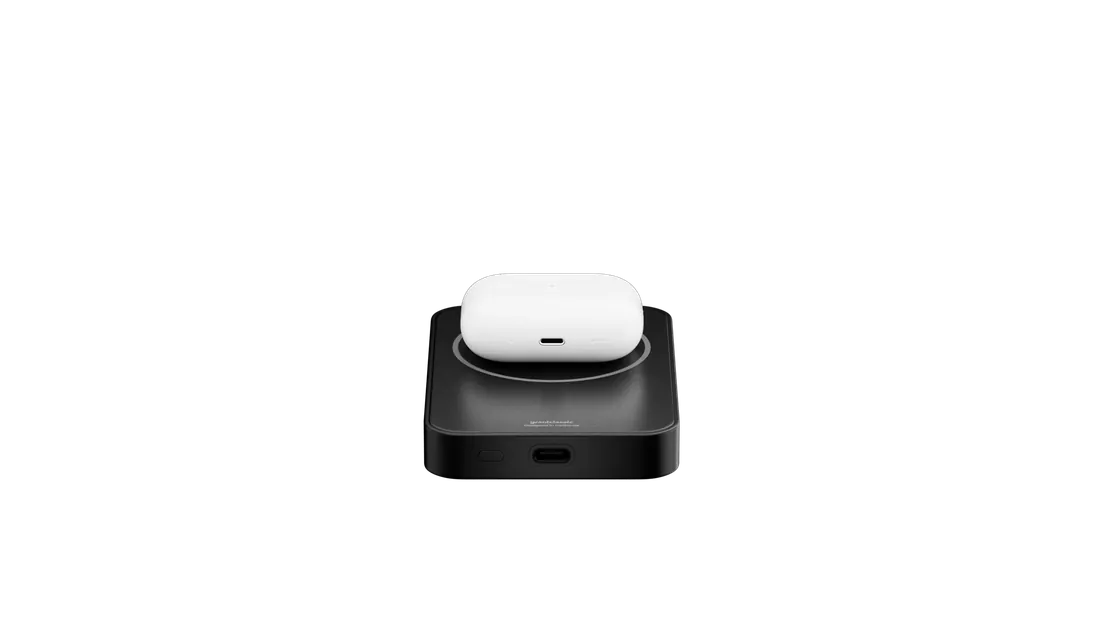 TITANSHIELD Pro wirelessly charging an AirPods case